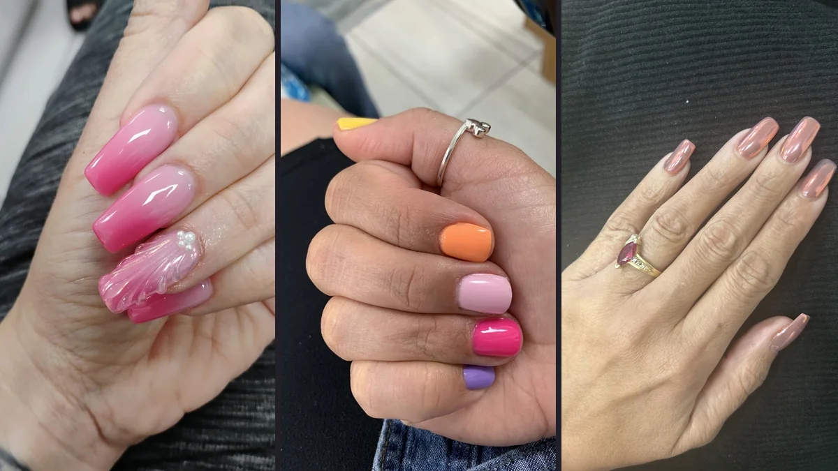 Close-up of manicured nails beside nail supplies